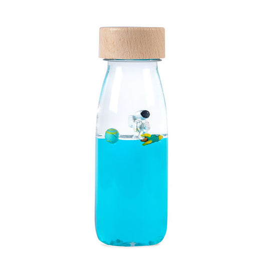 Botella Sensorial Move Bottle Universe de Petit Boum